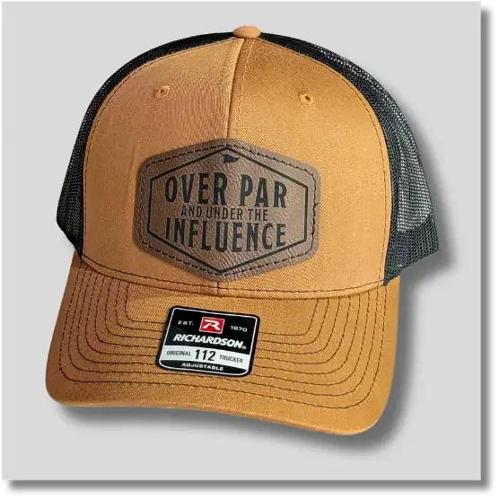 Caramel Over Par Under the Influence golf hat featuring a dark decorative patch with humorous golf-themed lettering
