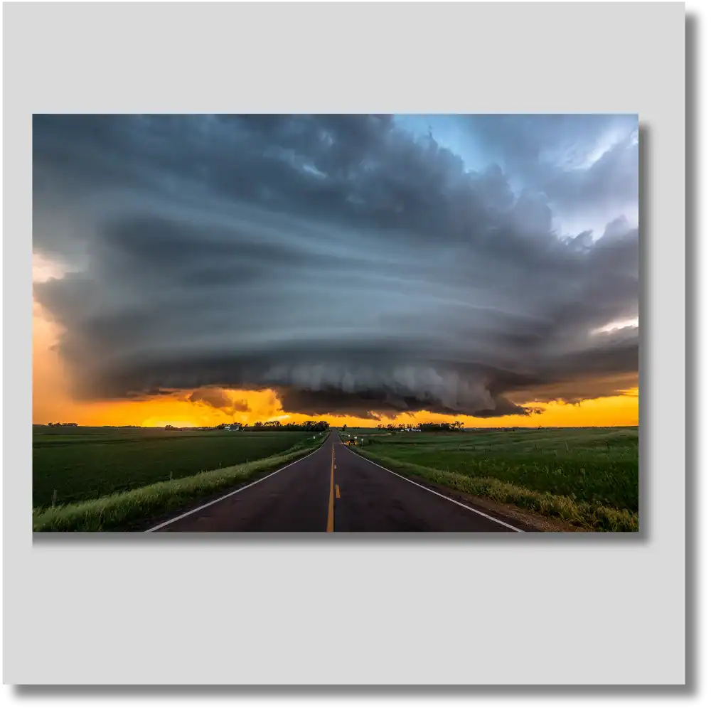 Dakota Majesty extreme weather photography wall art showing sweeping thunderstorm clouds above a sunlit prairie landscape