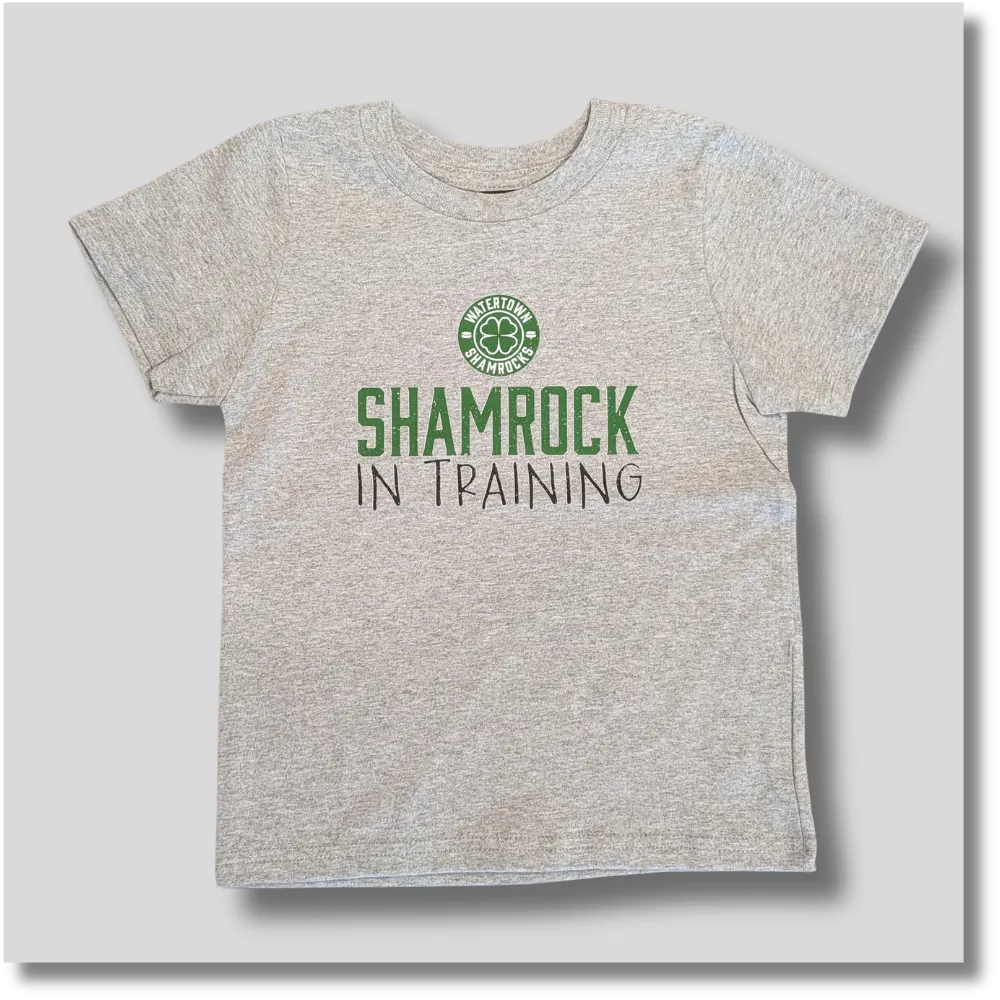 Light gray Shamrock in Training toddler T-shirt featuring green hockey-themed lettering and a shamrock graphic