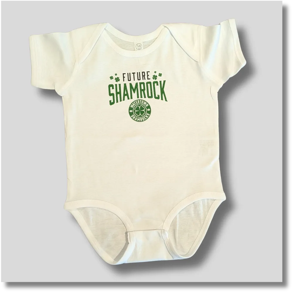 Cream Future Shamrock baby onesie featuring a green shamrock and hockey-inspired graphic