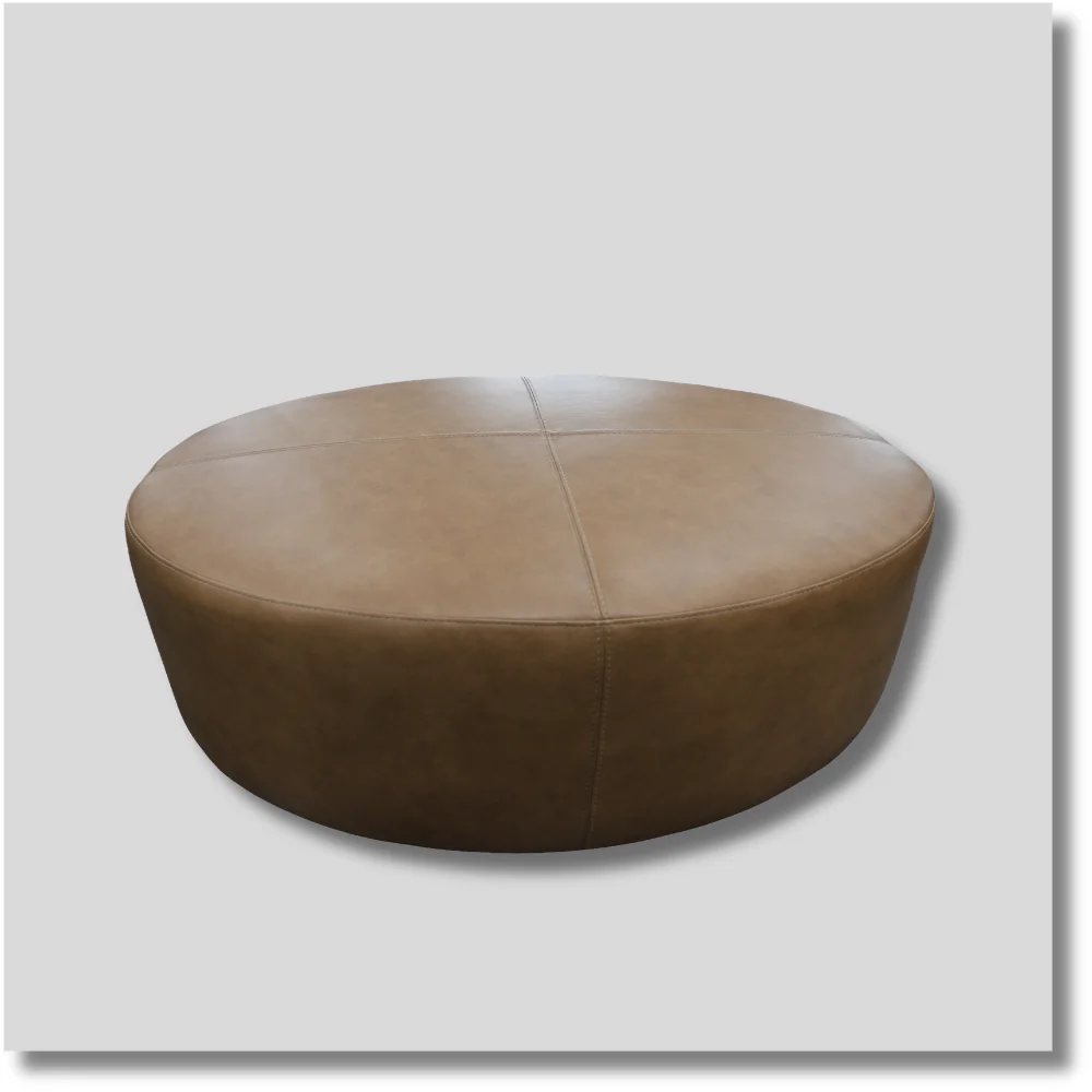Bullet premium leather oval ottoman with warm brown upholstery, rounded edges and cushioned top