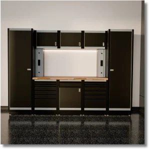 10-foot heavy-duty steel garage tool cabinet system with dark steel cabinets, built-in tool drawers, upper storage and integrated workbench.