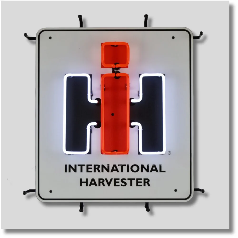 International Harvester neon sign featuring classic IH logo in red, black and white